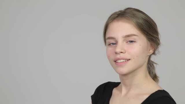 Girl shows different facial expressions and emotions