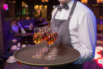 
Glass dishes in color lights background

