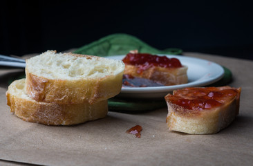 Jelly on sliced bread on a plate