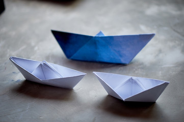Dreams about the sea. A symbol of travel and freedom. A ship made of paper