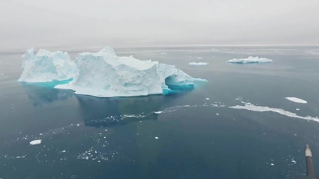 Aerial view of icebergs on arctic ocean in Greenland