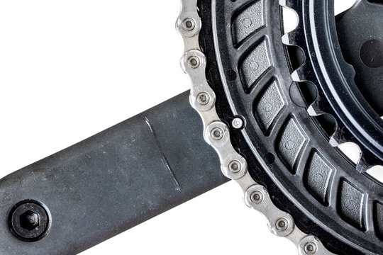 The drive gear of bicycle with pedal on a white background,  close-up view.