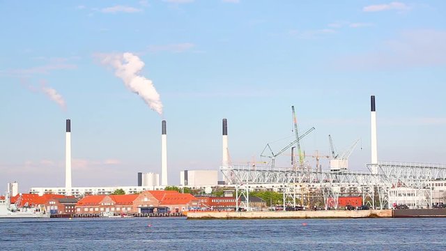 Power plant with chimney stacksa and smoke in Copenhagen