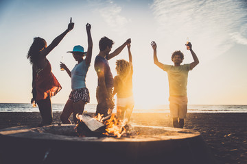Friends partying on the beach