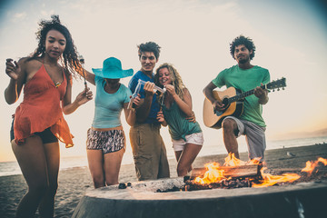 Friends partying on the beach