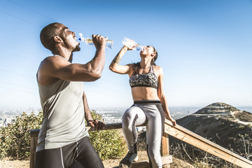 Couple training outdoors