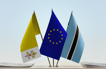 Flags of Vatican City European Union and Botswana