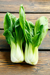 Bok choy nutrition facts and health benefits on wooden background