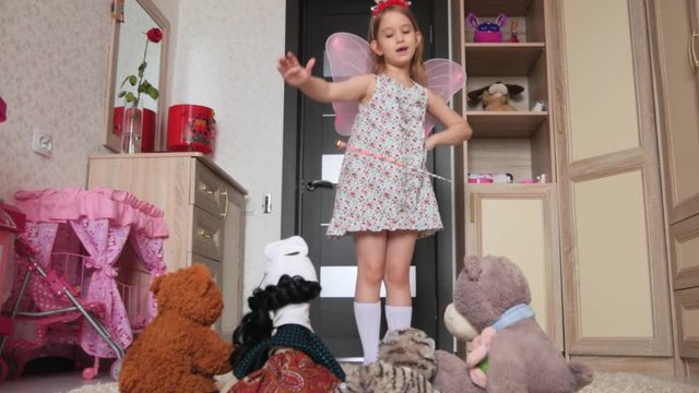 Funny little girl dancing in her room