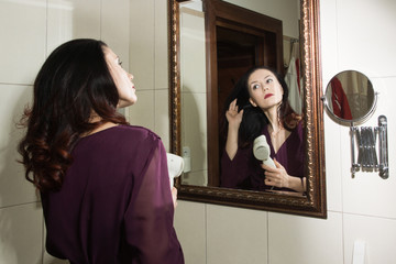 Beautiful sexy woman in a  bathroom