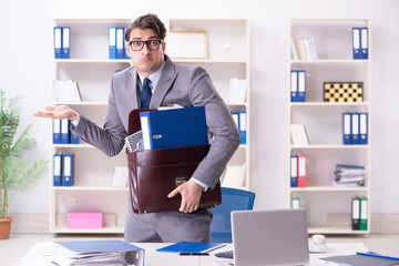 Employee with too much work taking it home