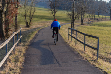 people practise outdoor exercise like walking running or cycling © rudolfgeiger