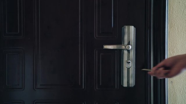 Close up on a door handle as the door is opened. Symbol of new hope, fresh starts and making an entrance.