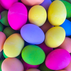 Fototapeta na wymiar Close-up of colourful eggs flat lay on plate.