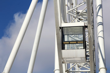 Ferris wheel municipal park with blue clear sky on the background