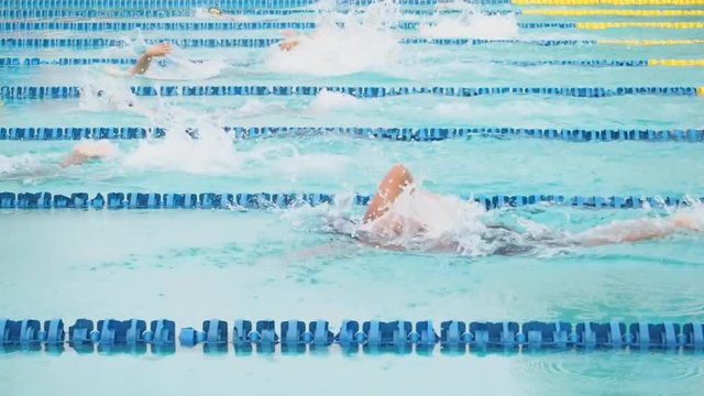 Athlete swimming in pool for competition 