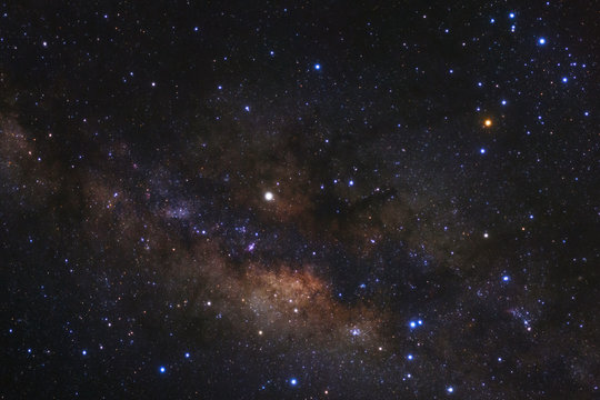 Milky way galaxy with stars and space dust in the universe, Long exposure photograph, with grain. © sripfoto