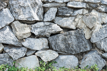Fototapeta premium Rock wall or Stone wall for protect wave breaker at the sea.
