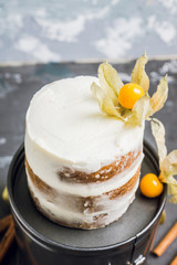 Carrot cake with spices on the rustic background. Selective focus.