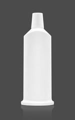 blank packaging plastic toothpaste tube isolated on gray background