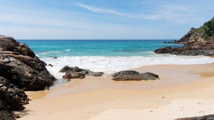 Beautiful scenery landscape of tropical sea and wave crashing on sandy shore in thailand.