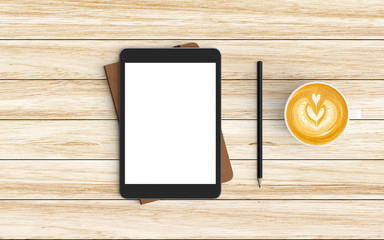 Modern workspace with coffee cup, notebook, tablet or smartphone and pencil copy space on wood background. Top view. Flat lay style.