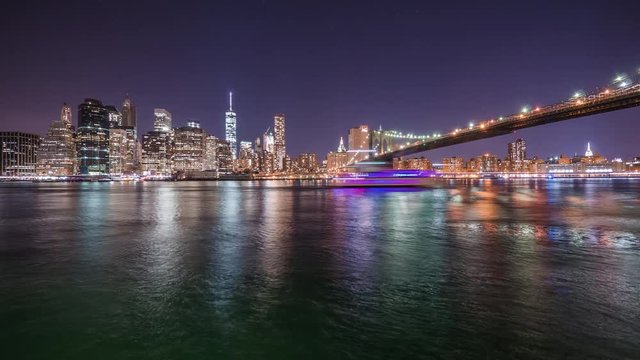 NIght timelapse of NYC reflecting in the water