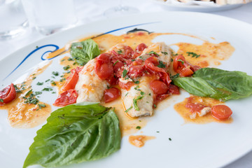 Cod with tomato and basil