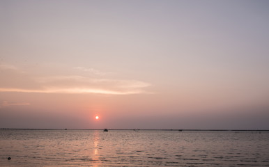 Sky and sea views. Sunset in the sea Evening light, beautiful white cloud.