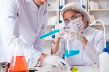 Young female woman doctor in hospital clinic lab