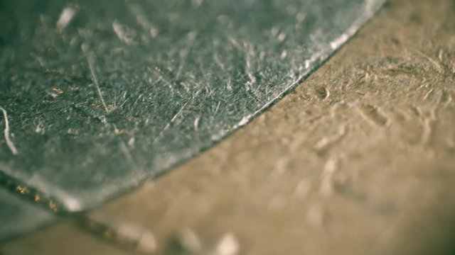 Old scratched bimetallic Euro coin. Super macro shot