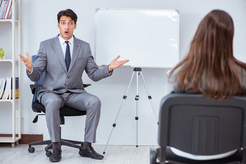 Fototapeta premium Business presentation in the office with man and woman