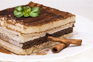 delicious tiramisu isolated on white