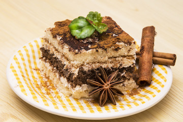 delicious tiramisu on wooden background
