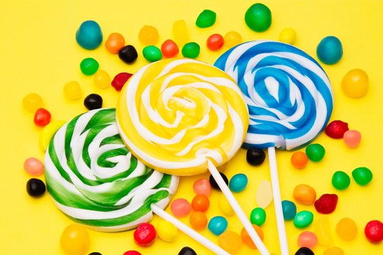 colorful spiral lollipops on colorful backgrounds