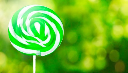 colorful spiral lollipops on colorful backgrounds