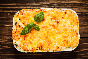 Lasagna on wooden table