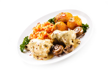 Wrapped pork chop with boiled potatoes and vegetables