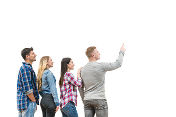 Fototapeta premium The four happy people stand and gesture on the white background