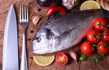 Fish dorado and vegetables