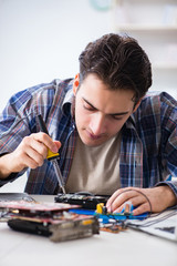 Computer hardware repair and fixing concept by experienced techn