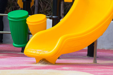 yellow slider at public playground