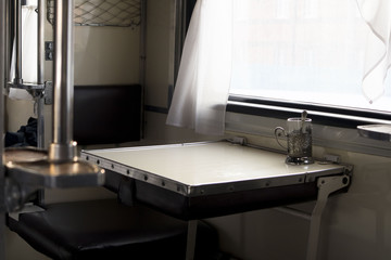 View of the empty seats in the lower second-class compartment wagon train