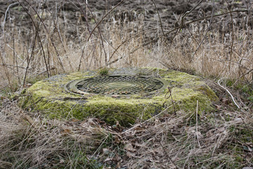 A rising channel with a metal lid.