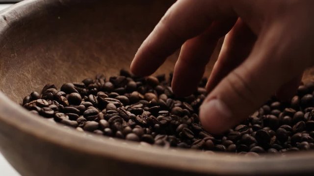 Closeup super slow motion shot of roasted coffee beans