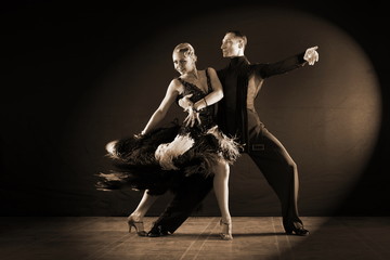 dancers in ballroom isolated on black background