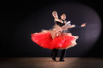 dancers in ballroom isolated on black background