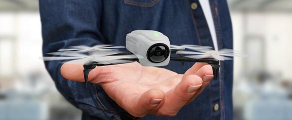 Businessman using modern drone 3D rendering - obrazy, fototapety, plakaty