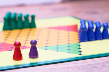 colorful play figures on board