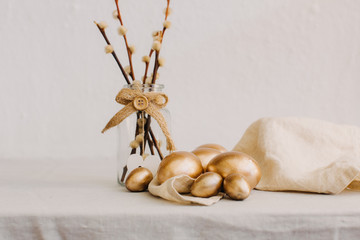 Rural Happy Easter. Linen napkin with Easter eggs on rustic background